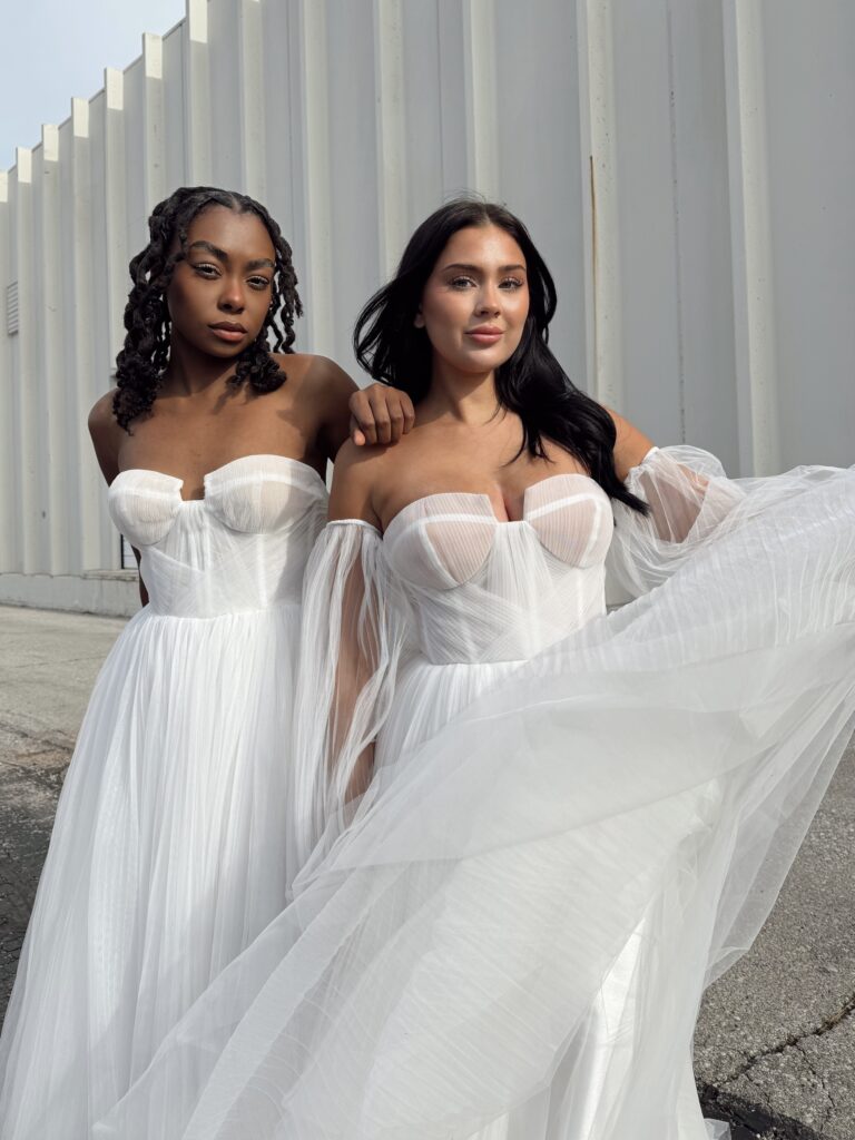 2 vow ready bridal models outside