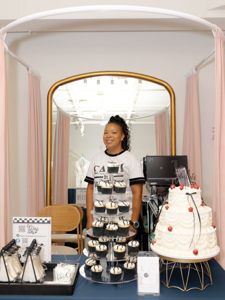 Local vendor showcasing products and accessories during the Vow Ready grand opening celebration.