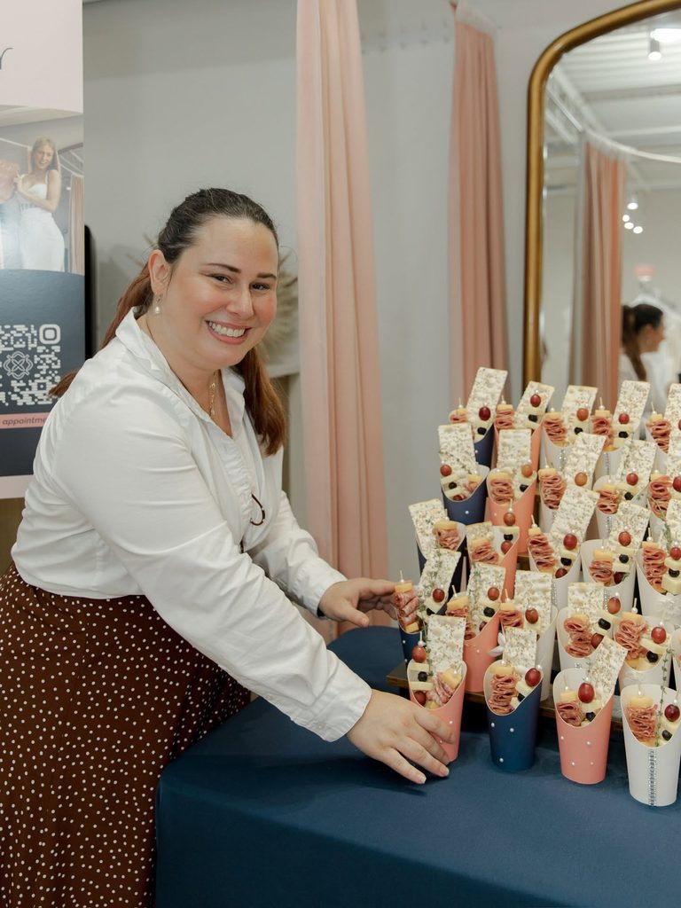 Event vendor showcasing colorful treats at the Vow Ready North Kansas City grand opening.